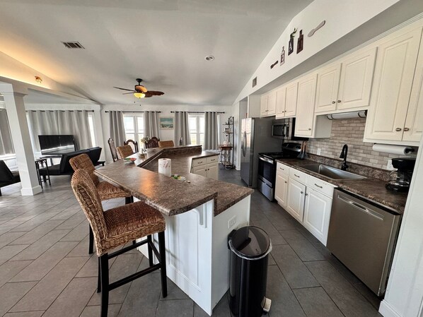 House, Multiple Beds, Patio, Garden View (Blue Lagoon) | Private kitchen | Dining tables - Blue Lagoon (Gulf Shores)