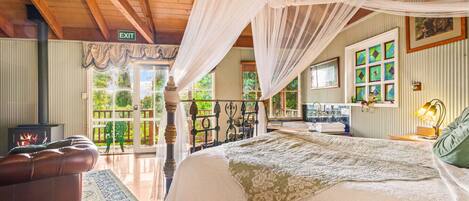 1 bedroom, desk, iron/ironing board, travel crib