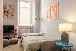 2 bedrooms, desk, iron/ironing board, travel crib