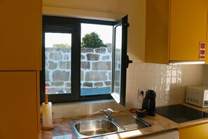 Fridge, microwave, coffee/tea maker, electric kettle