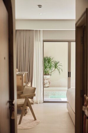 Habitación Prestigio, 1 cama King size, vista a la alberca | Ropa de cama de alta calidad y artículos del minibar gratis