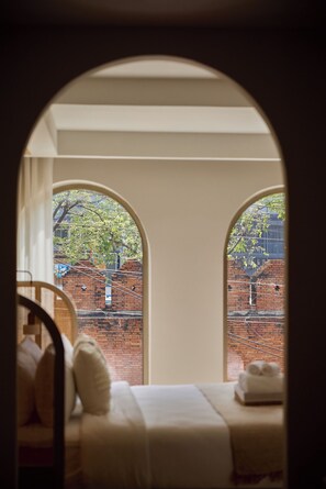 Premium bedding, free minibar items, in-room safe, iron/ironing board