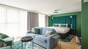 Suite, 1 cama King size y sofá cama | Ropa de cama hipoalergénica y minibar