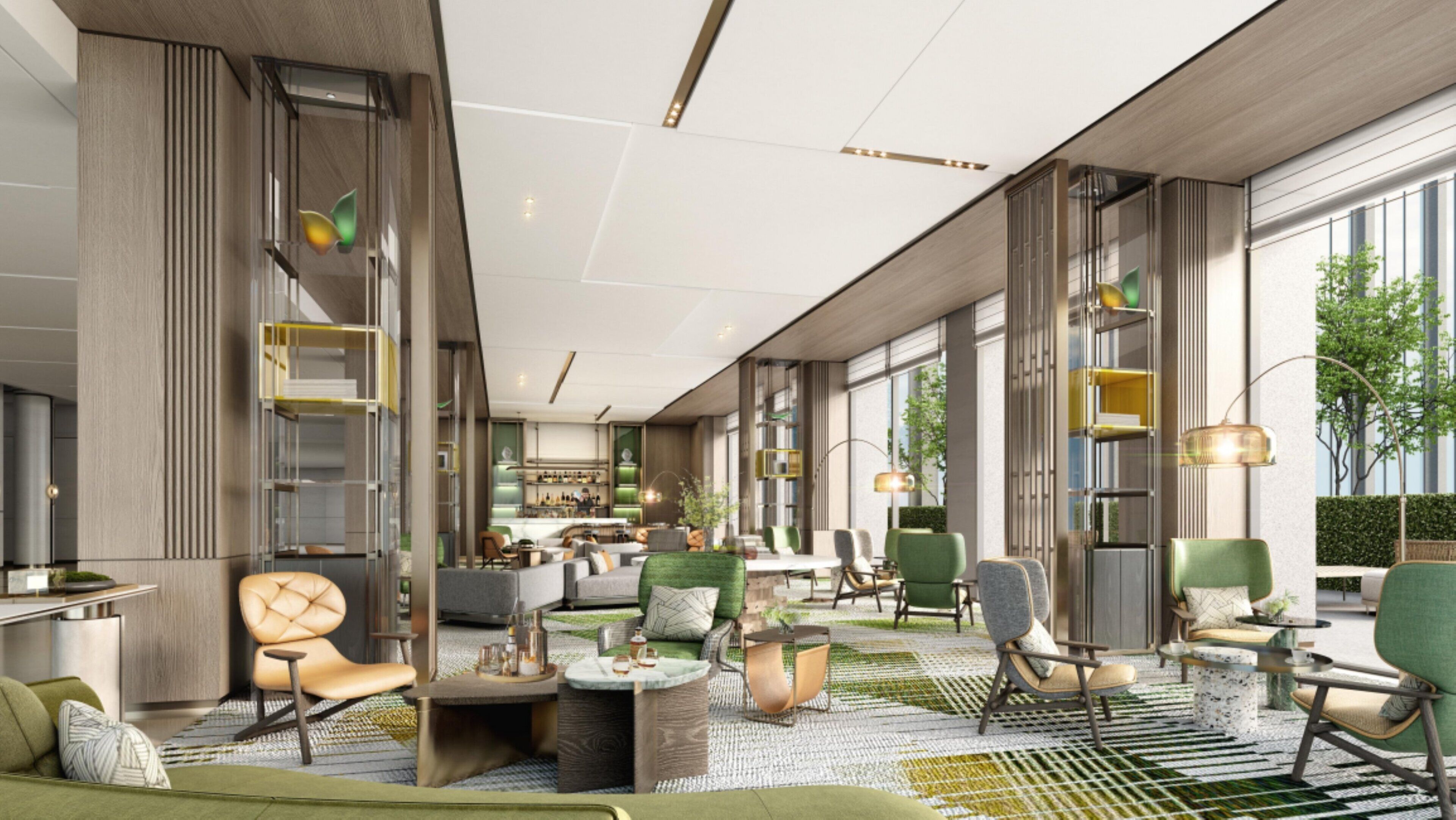 A modern hotel lobby with a mix of seating areas, a bar, and large windows offering views of greenery.