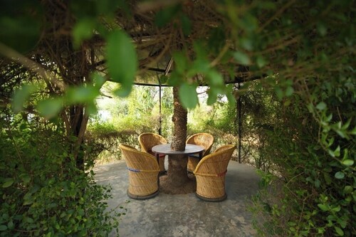 Charming farmhouse retreat with lush gardens and serene views