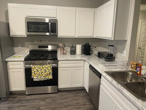 Fridge, microwave, oven, stovetop - Happy Stay brand new 3-bedroom 2-Full bath house in serene Broken Arrow (Broken Arrow)