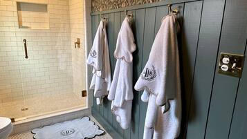 Shower, jetted bath, towels, soap