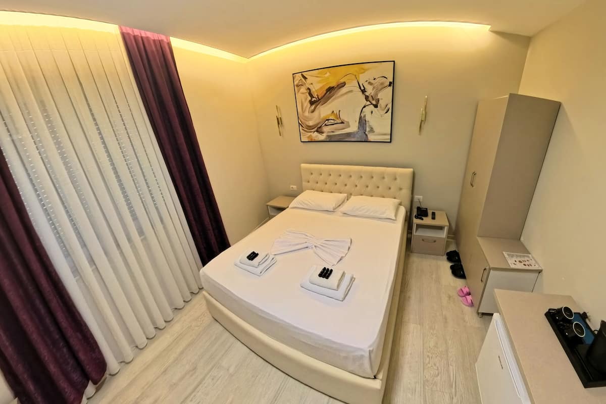 Premium bedding, down duvets, in-room safe, individually decorated