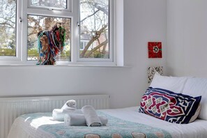 1 bedroom, desk, iron/ironing board, travel cot