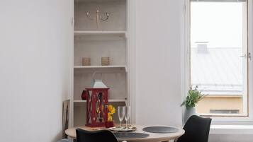 Basic Apartment, City View | Living area | 45-inch flat-screen TV with cable channels