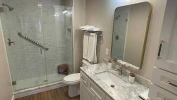 Hair dryer, towels, soap, shampoo