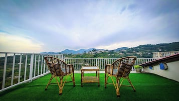 Luxury Quadruple Room, Balcony, Mountain View | Terrace/patio