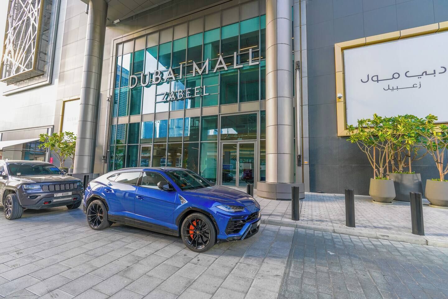 A modern building with the sign "DUBAI MALTE ZABEEL".