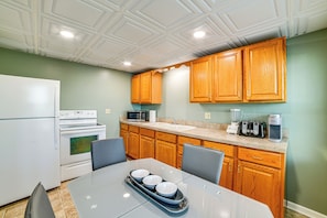 Fridge, microwave, stovetop, coffee/tea maker