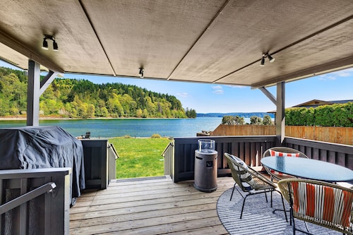 Modern Waterfront Escape with Grill, Patio, and Nature Views