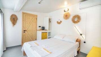 Deluxe-huone, kaupunkinäköala | Tallelokero huoneessa, ilmainen Wi-Fi