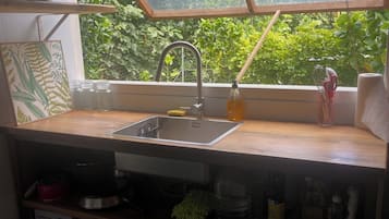 Fridge, microwave, stovetop, coffee/tea maker