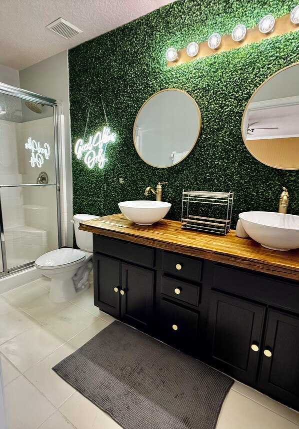 Shower, hair dryer, towels, soap