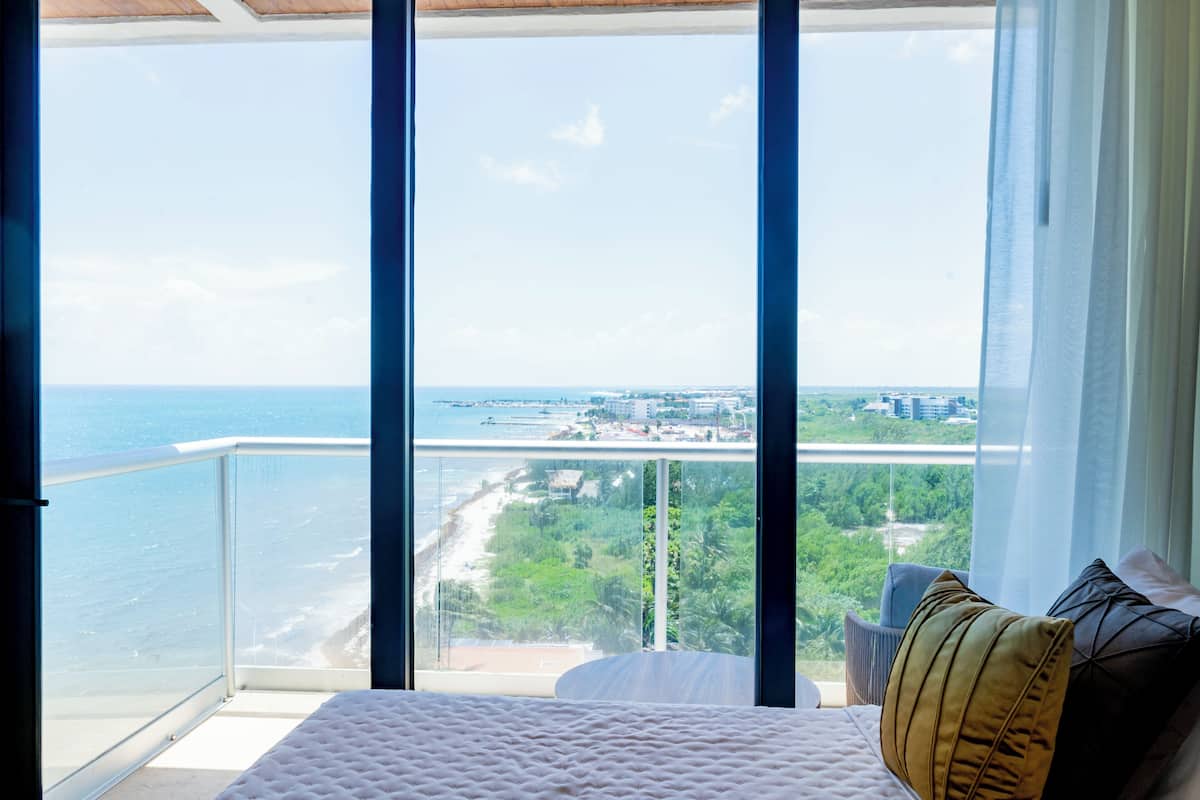 Deluxe Suite, Balcony, Partial Ocean View | 2 bedrooms, in-room safe, iron/ironing board, free WiFi