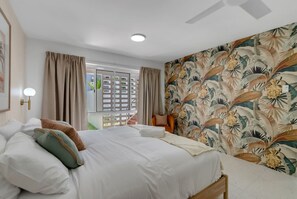 1 bedroom, desk, iron/ironing board, travel crib