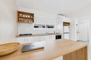 Fridge, microwave, stovetop, coffee/tea maker