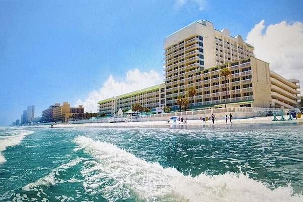On the beach, sun-loungers, beach towels