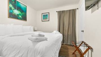 Iron/ironing board, travel crib, free WiFi, bed sheets