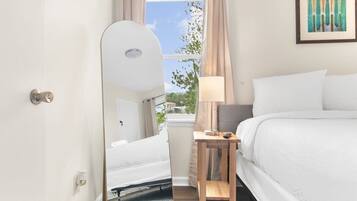 Iron/ironing board, travel crib, free WiFi, bed sheets