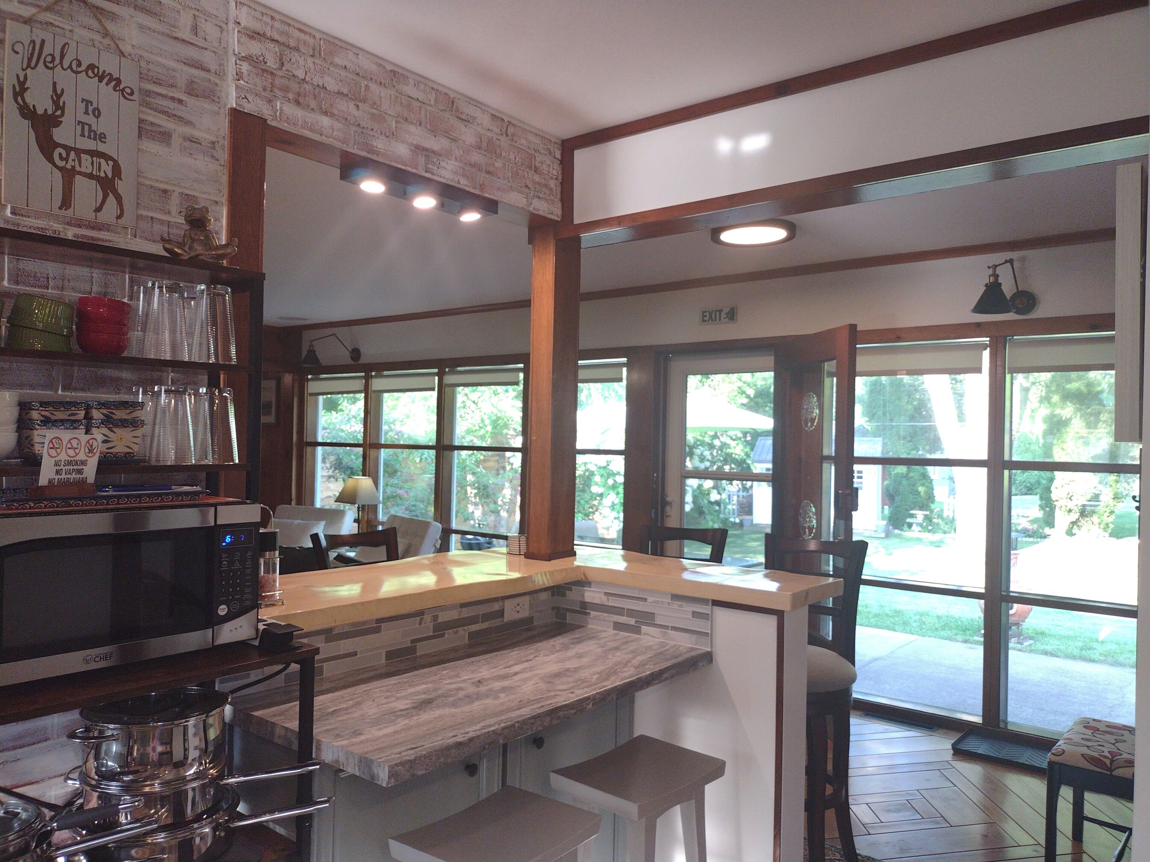 Open concept, kitchen and bar open up into great room