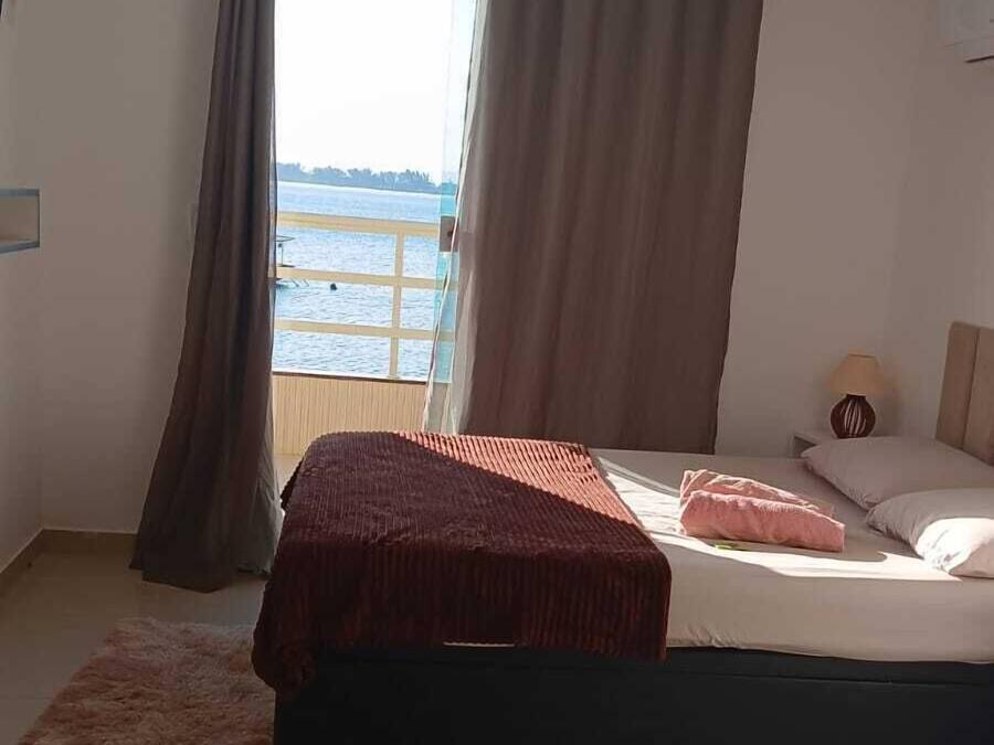 Deluxe Suite, Sea View | Blackout curtains, iron/ironing board (on request), free WiFi
