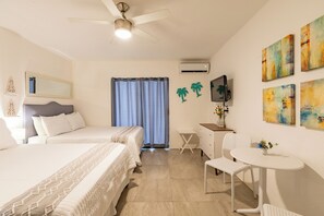 2 dormitorios, caja fuerte, tabla de planchar con plancha