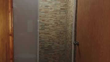 Shower, towels, soap, toilet paper