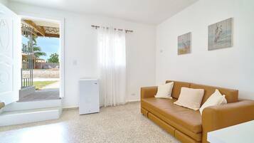 Basic Apartment, Non Smoking, Air conditioning | Living room | 32-inch Smart TV with digital channels, Netflix, streaming services