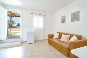 Basic Apartment, Non Smoking, Air conditioning | Living room | 32-inch Smart TV with digital channels, Netflix, streaming services