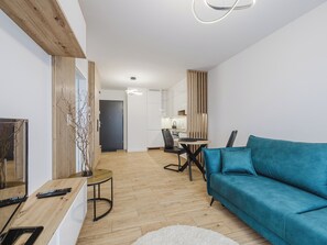 TV - Osiedle Verde Homely Apartment (Poznan)