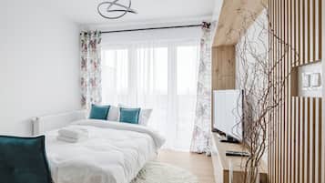 1 dormitori, planxa i posts de planxar, wifi i roba de llit