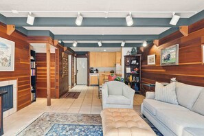 Smart TV, fireplace, books
