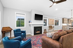 Smart TV, fireplace, books