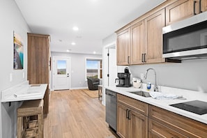Fridge, microwave, dishwasher, coffee/tea maker