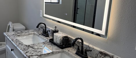 Shower, jetted tub, hair dryer, towels