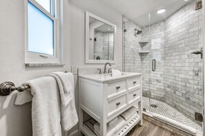 Shower, hair dryer, towels