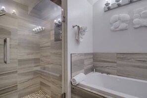 Shower, hair dryer, towels, shampoo
