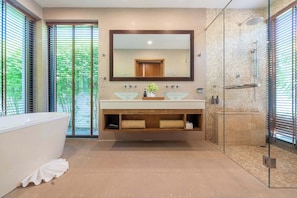 Shower, hair dryer, towels, shampoo