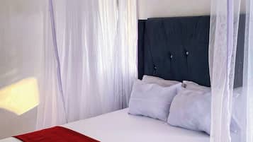 1 dormitorio, tabla de planchar con plancha, Internet y ropa de cama