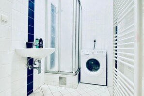 Shower, hair dryer, shampoo