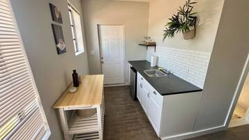 Microwave, oven, coffee/tea maker, cookware/dishes/utensils