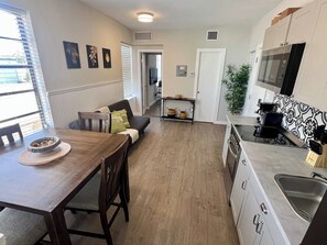 Microwave, oven, coffee/tea maker, cookware/dishes/utensils