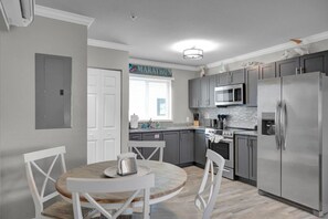 Microwave, coffee/tea maker, toaster, cookware/dishes/utensils