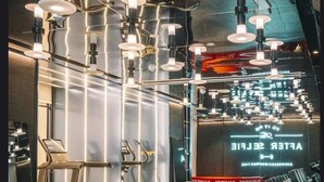 A modern gym with treadmills, stationary bikes, and weight benches. - lyf Xian Dayanta by Ascott (Xi'an)