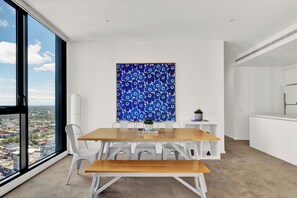 Deluxe Apartment, 3 Bedrooms, Balcony, City View | In-room dining